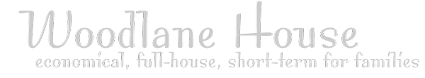 Woodlane House logo - tagline economical accomodations for families
